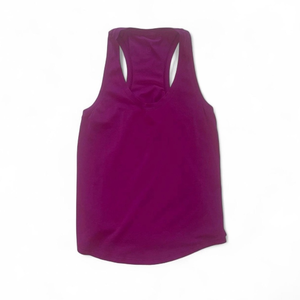 Lululemon magenta racerback tank top. No size tag, measurements size 6